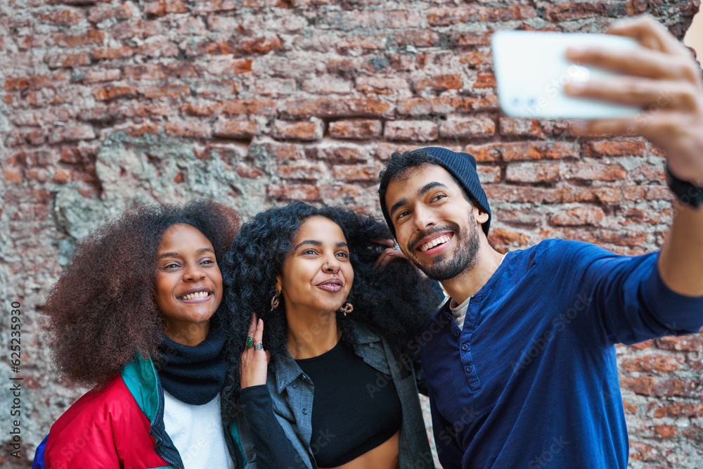 multiracial group of three people making selfie happy portrait background