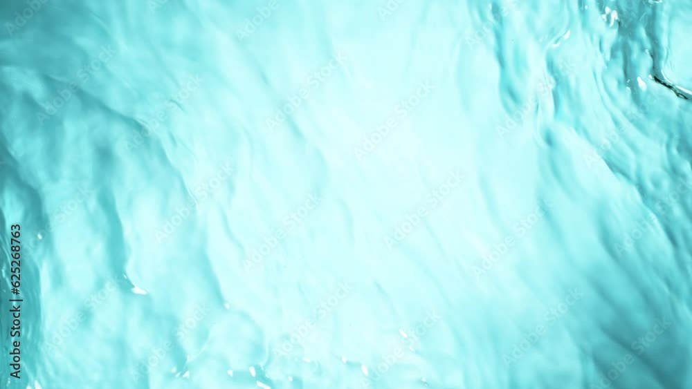 Super Slow Motion Abstract Shot of Waving Blue Clear Water Surface at 1000fps. Super Slow Motion Abstract Shot of Waving Blue Clear Water Surface at 1000fps.