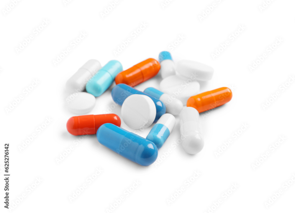 Many different pills isolated on white. Medicinal treatment Many different pills isolated on white. Medicinal treatment