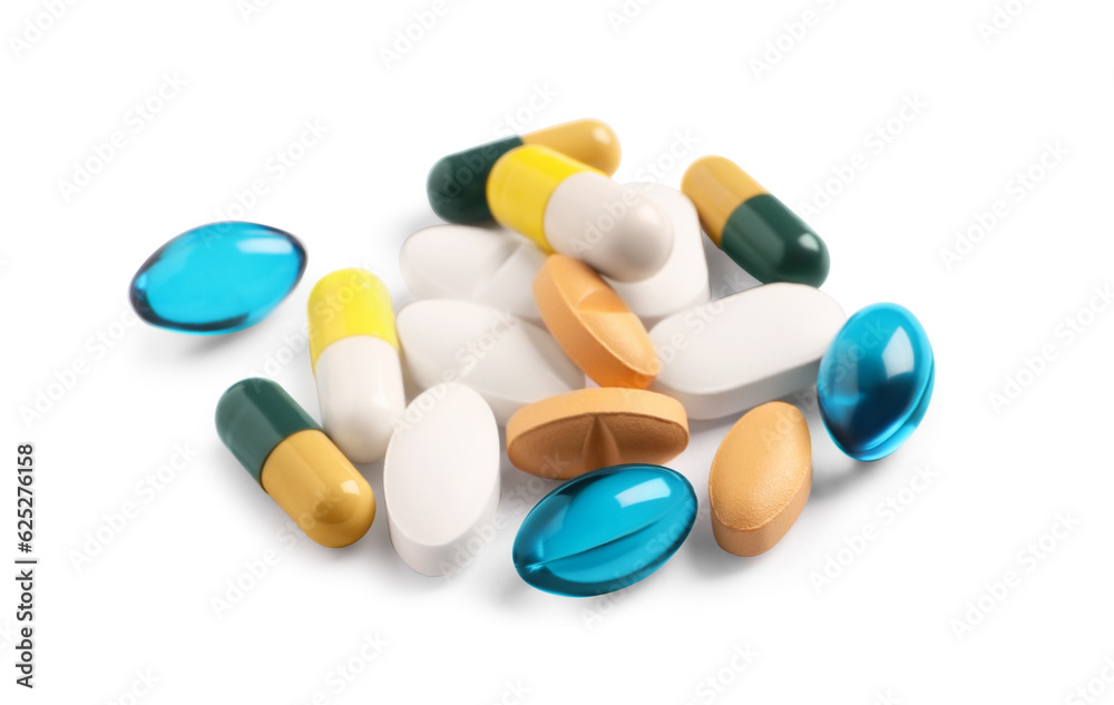 Many different pills isolated on white. Medicinal treatment Many different pills isolated on white. Medicinal treatment