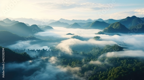 Foggy landscape. Fog and cloud mountain tropic valley landscape. aerial view © Cedric