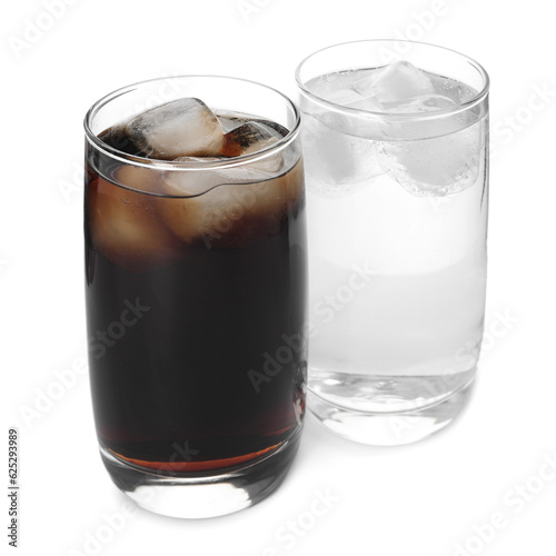 Glasses of different refreshing soda water with ice cubes on white background