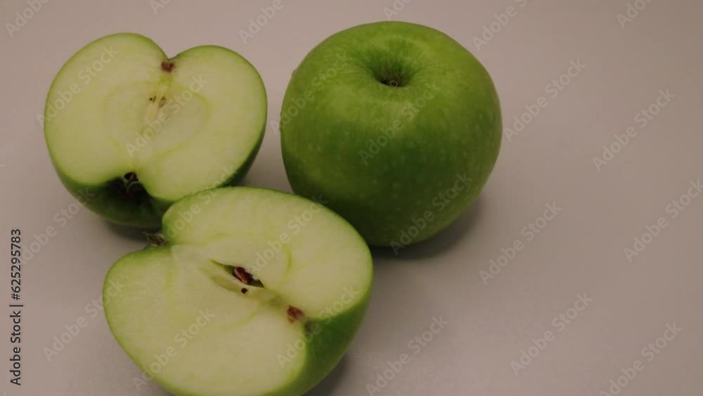 organic green apple on rotating stand organic green apple on rotating stand