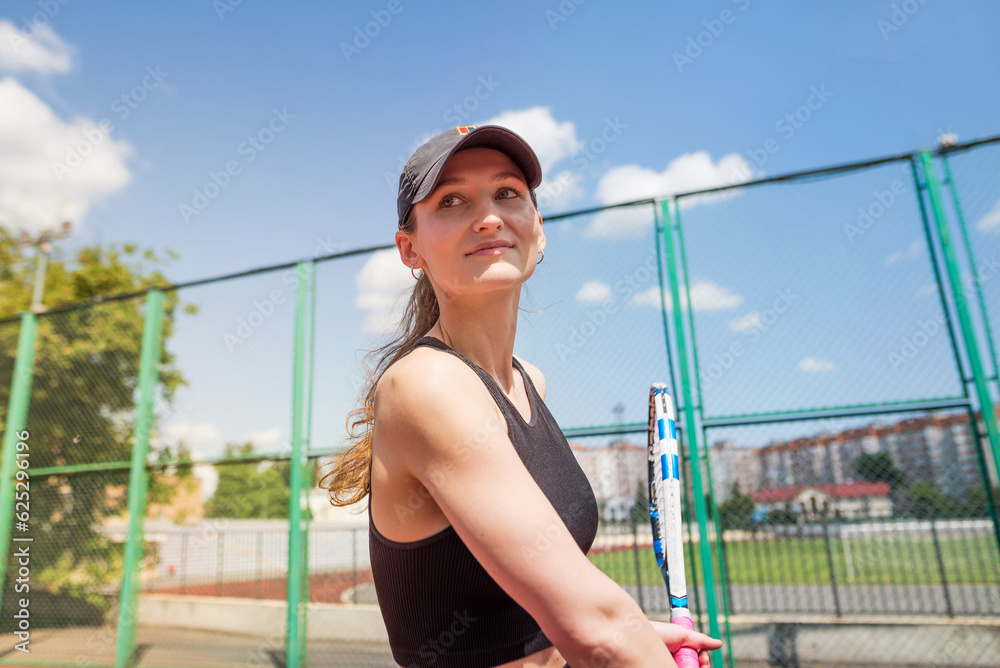 Sports girl with racket and tennis ball. A beautiful young girl is exercising. Sports girl with racket and tennis ball. A beautiful young girl is exercising.