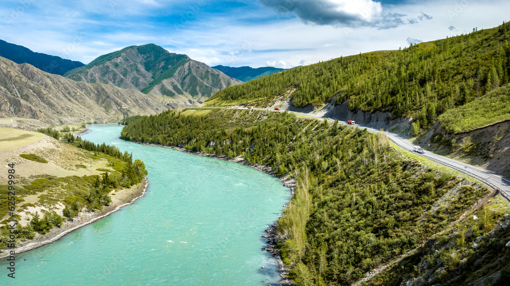 Turquoise Katun River valley in Altai Mountains. Panoramic aerial view along scenic highway Chuysky Tract. Nature landscape near Maly Yaloman, Altai Republic, Siberia, Russia