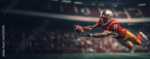 Canvas-taulu An American football player catches the ball in a beautiful jump