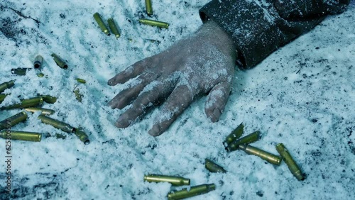 Arm Of Dead Soldier On Snowy Battlefield
 photo