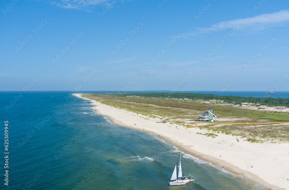 Sailboat on the beach at Fort Morgan, Alabama Sailboat on the beach at Fort Morgan, Alabama