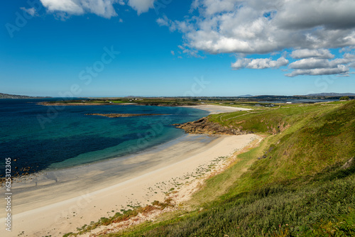 Scenic view of the Atlantic Ocean and a beautiful beach at the coast near Maghery, County Donegal, Ireland