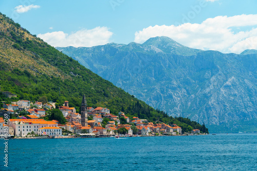 seascapes, a view of the Bay of Kotor during a cruise on a ship in Montenegro, a bright sunny day, mountains and small towns on the coast, the concept of a summer trip © soleg