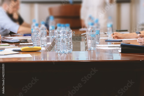 The Ukrainian delegation is sitting at the round table.