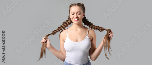 Beautiful young woman with ...