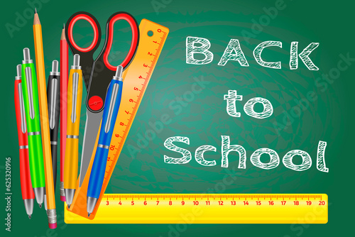 Back to school, written on blackboard with chalk with realistic school items - colored pencils, scissors, pen and ruler in green background texture