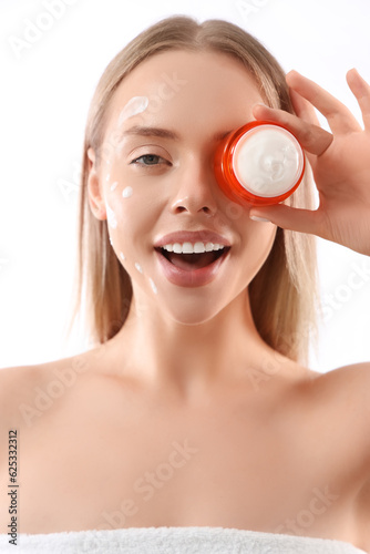 Pretty young woman with fac...