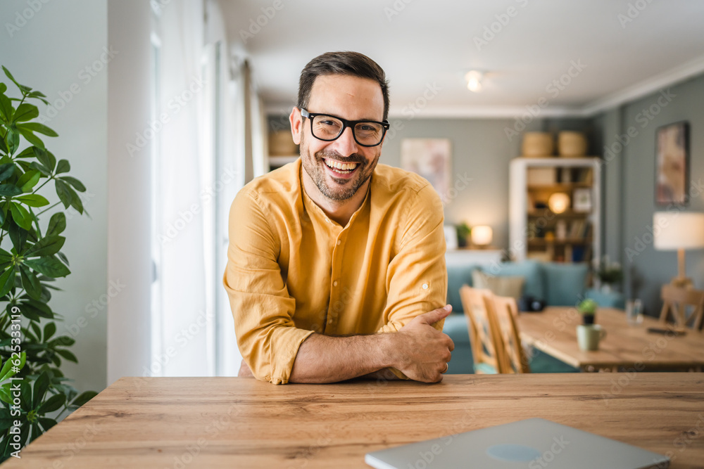 Fototapeta premium One adult man with eyeglasses stand at home happy smile