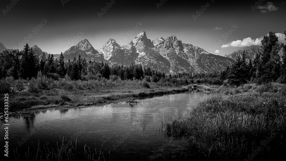 Fototapeta premium Black and White Landscape Photo of the view of the Grand Tetons from Schwabacher Landing in Grand Teton National Park, Wyoming, USA