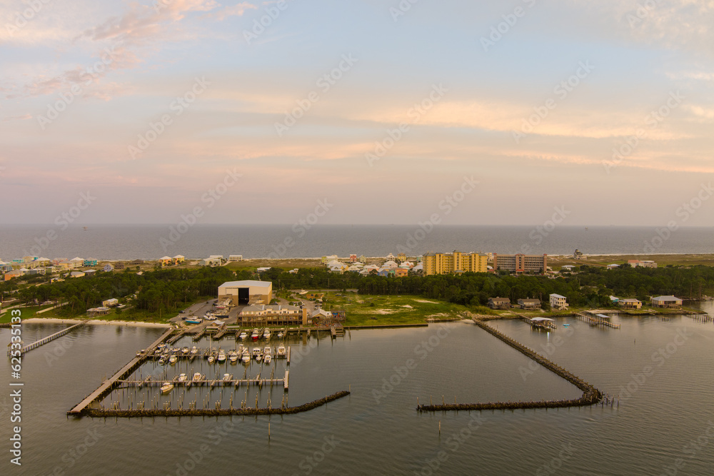 Fototapeta premium Fort Morgan, Alabama beach at sunset in july