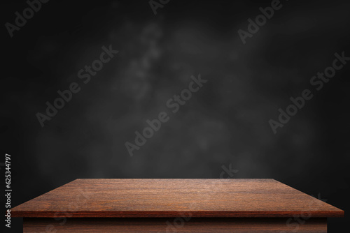 Wooden surface. Old table. Texture boards. Table surface with perspective. Table with dust cloud on black