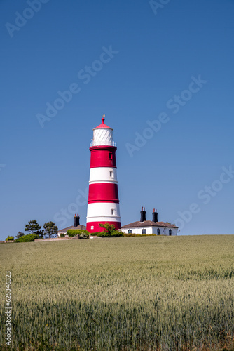 View of Happisburgh lighthouse on a spring afternoon, North Norfolk, England
