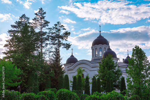 Church with ornamental garden in the morning photo