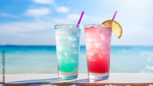 Couple of pastel ice-cold cocktails for a warm summer day on the beach