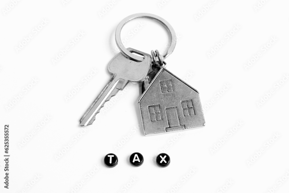 Tax, Silver House Key Ring On White Background Tax, Silver House Key Ring On White Background