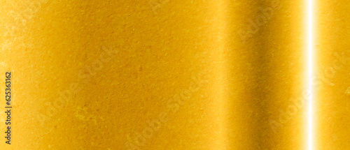 Shiny gold surface as background, closeup view