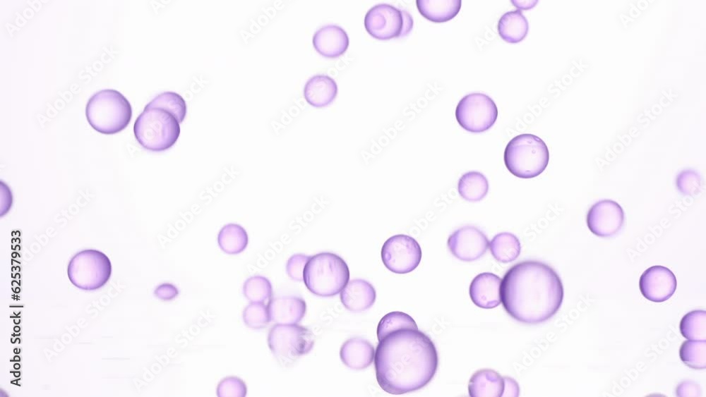 Cosmetic purple bubbles of serum on white background. Cosmetic purple bubbles of serum on white background.