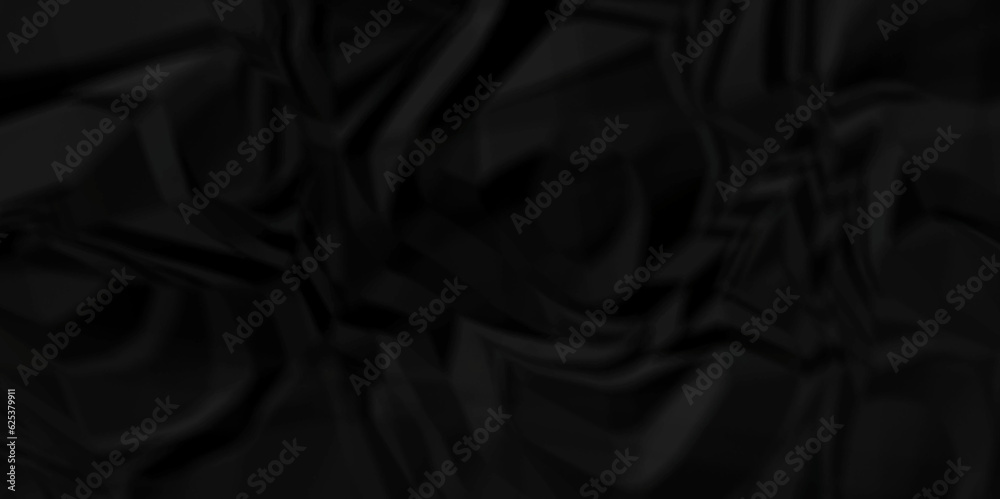 Black fabric background. Black crumpled and wrinkled paper texture crush paper so that it becomes creased and wrinkled. Old black crumpled paper sheet background texture. Black fabric background. Black crumpled and wrinkled paper texture crush paper so that it becomes creased and wrinkled. Old black crumpled paper sheet background texture.