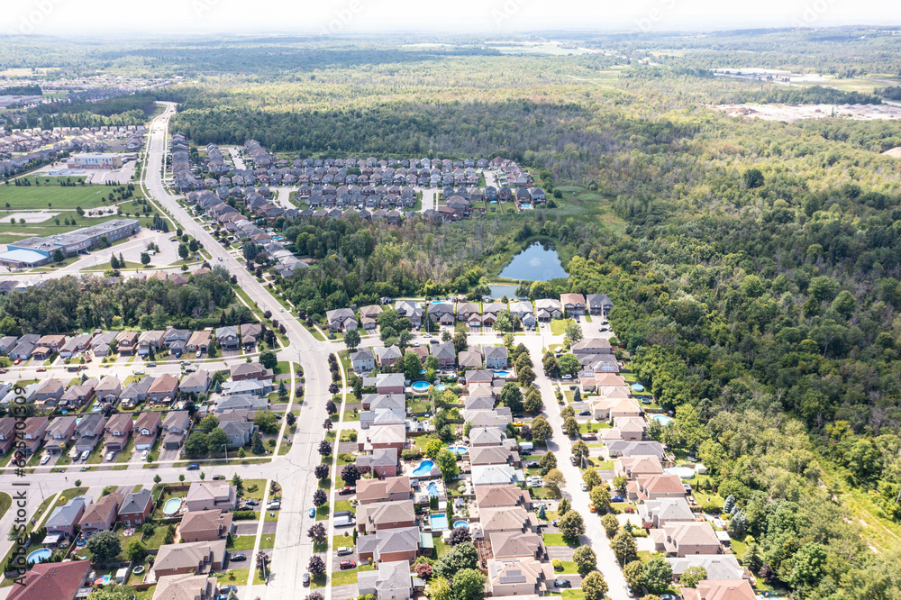 Discover the power of aerial imagery with our high-quality drone photos capturing stunning views of real estate houses in thriving Barrie, Ontario. 