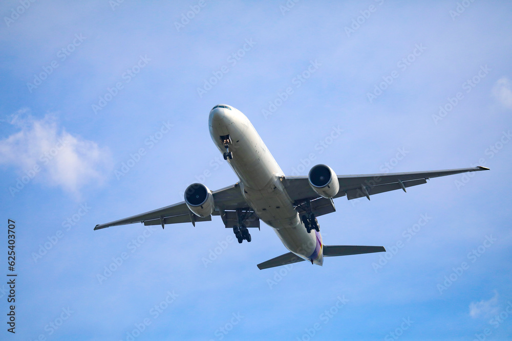 Passenger planes flying in the sky preparing to land at the airport airplane travel and international travel concept