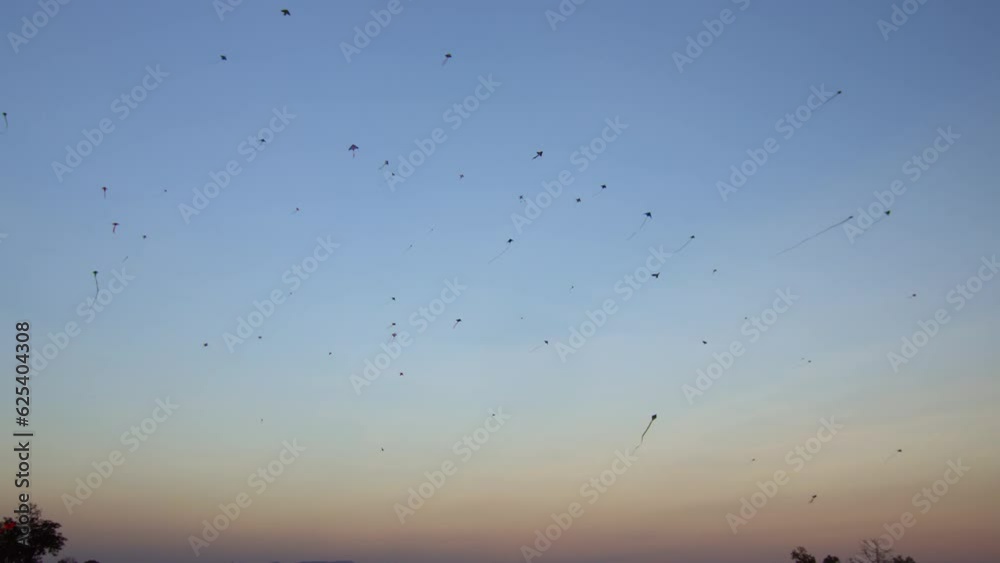 Different kites are flying in the sky Different kites are flying in the sky