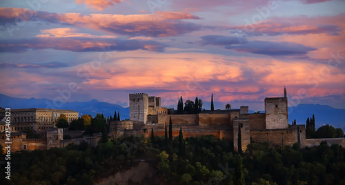 The landscape view with Alhambra of Granada, Spain. Alhambra fortress and Albaicin quarter at twilight sky scene