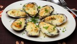 Baked Mussels under Cream Cheese Sauce
