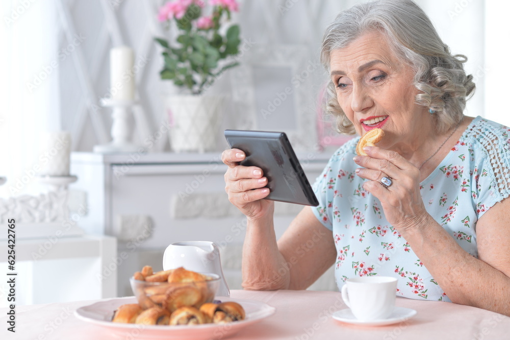 Portrait of Old woman with tablet