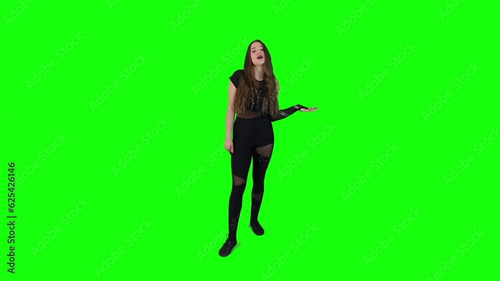 Young female actor expressing herself in front of a green screen in slow motion Young female actor expressing herself in front of a green screen in slow motion
