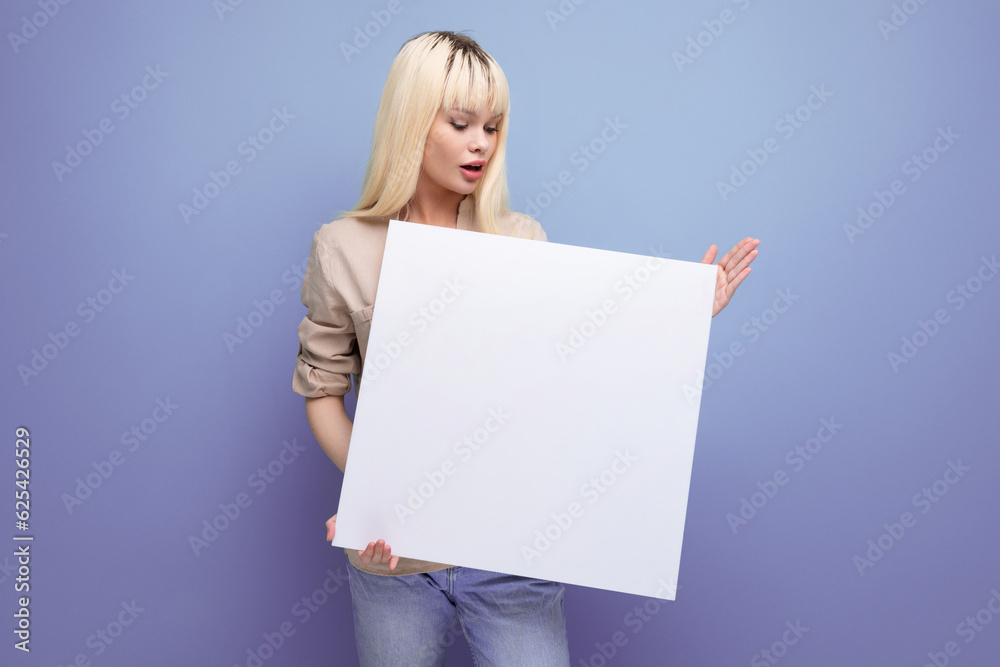 young woman showing paper sheet with blank space for notes young woman showing paper sheet with blank space for notes