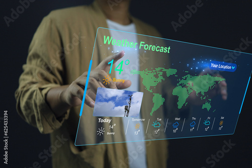 man in casual dress pointing hand to check the weather forecast on screen checking the weather during the day, such as temperature, wet dry bulb absulute humidity, relative, atmospheric pressure