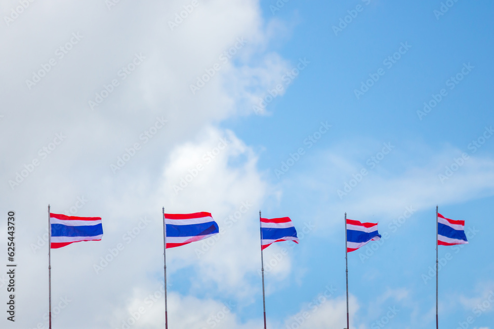 Thai flag of Thailand flag with blue sky and clouds background. Thai flag of Thailand flag with blue sky and clouds background.