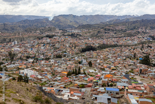 View from the scenic road to the landmark Muela del Diablo over the highest administrative capital, the city La Paz and El Alto in Bolivia © freedom_wanted
