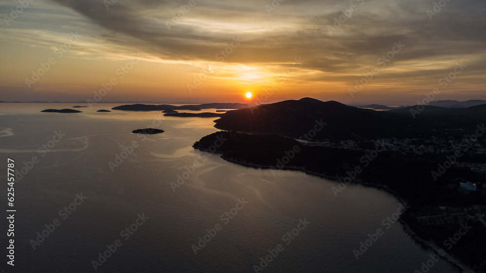 Sunset Drone areal view over islands. Church. Croatia Sunset Drone areal view over islands. Church. Croatia