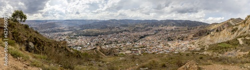View from the scenic road to the landmark Muela del Diablo over the highest administrative capital, the city La Paz and El Alto in Bolivia - Panorama © freedom_wanted