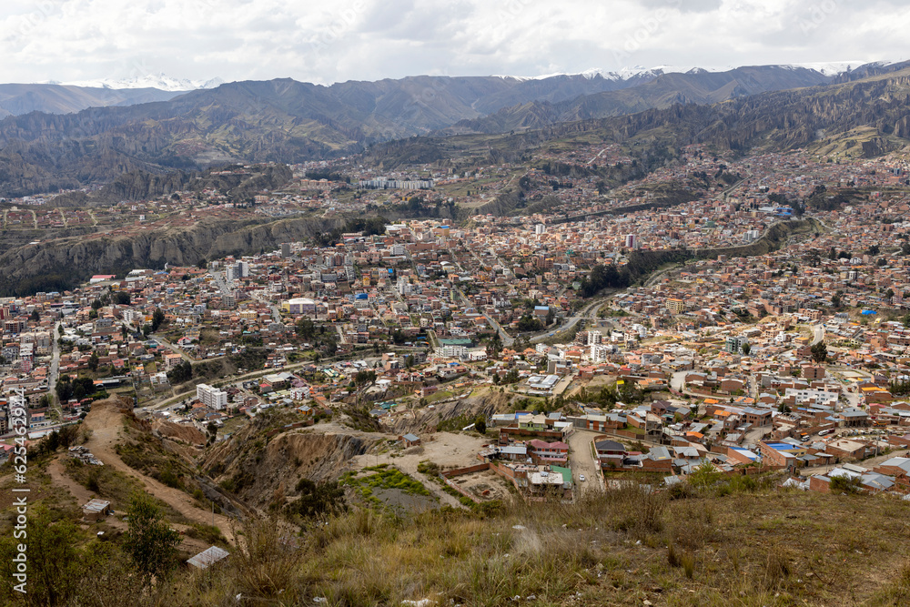 View from the scenic road to the landmark Muela del Diablo over the highest administrative capital, the city La Paz and El Alto in Bolivia