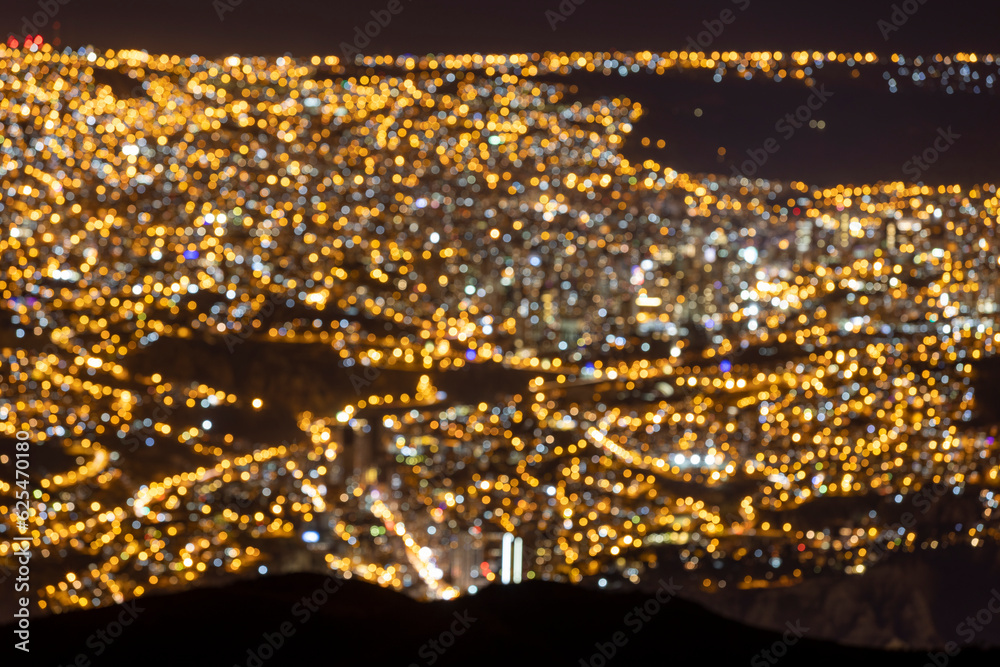 Obraz premium Blurred city lights of La Paz and El Alto, highest capital and vibrant city surrounded by the highest peaks of the Andes mountains in Bolivia