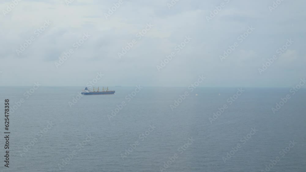 calm ocean open sea in aerial view while on cruise ship.horizon over ocean sea water sunlight reflection on seascape. calm ocean open sea in aerial view while on cruise ship.horizon over ocean sea water sunlight reflection on seascape.