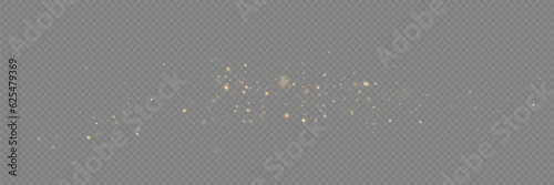 Golden sequins glow with many lights. Glittering dust. Luxurious background of golden particles.