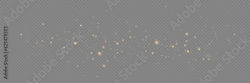 Golden sequins glow with many lights. Glittering dust. Luxurious background of golden particles.