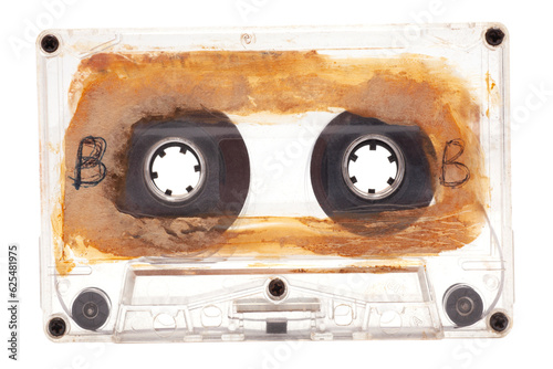 Close up of old audio tape cassette side B, isolated on white background, vintage 80's music concept.