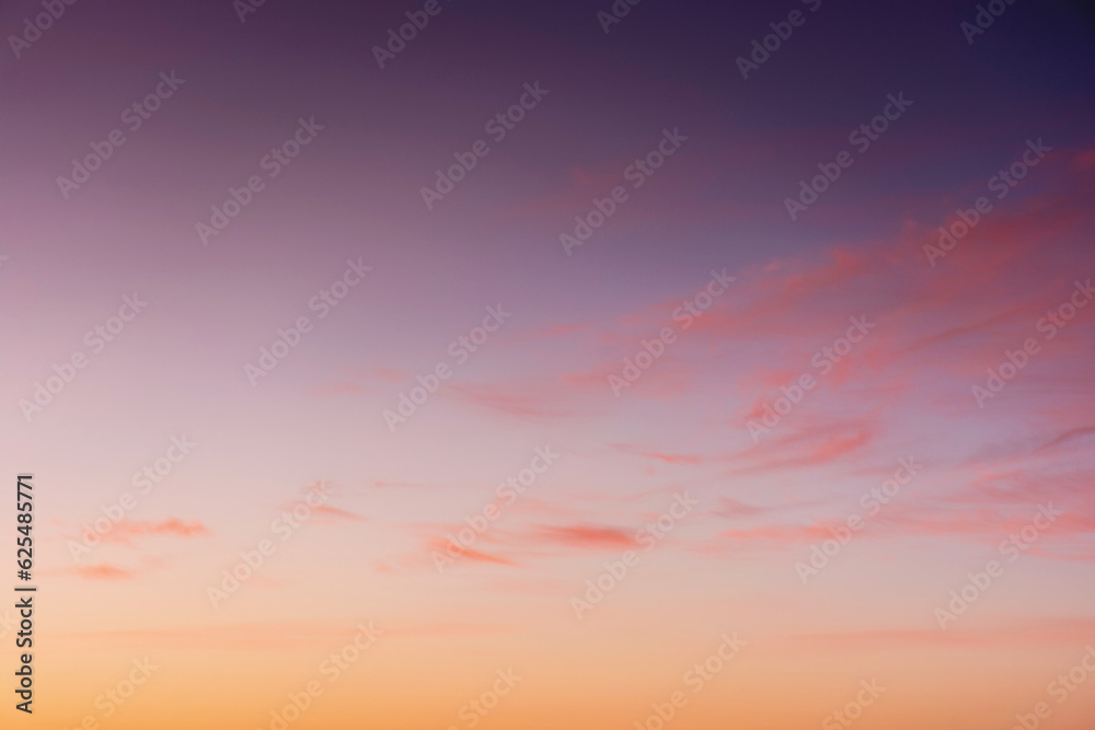 clouds on the sky at twilight. beautiful nature background in colorful light at dawn