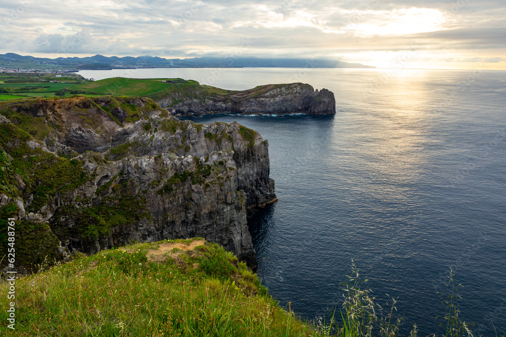 View of Ponta do Cintrao from Miraduro da Ribeirinha view point, Sao Miguel Island, Azores, Portugal. View of Ponta do Cintrao from Miraduro da Ribeirinha view point, Sao Miguel Island, Azores, Portugal.